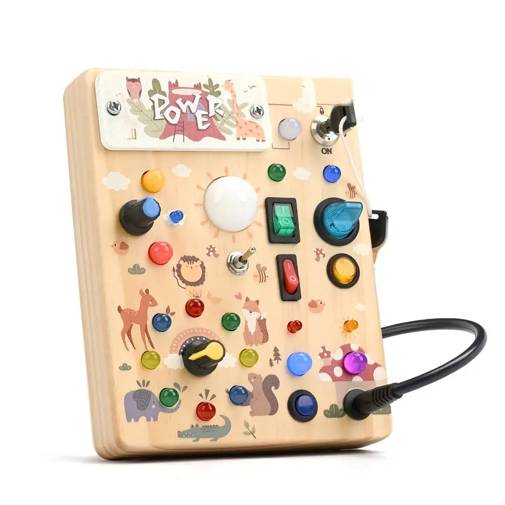 Forest LED busy board in light wood with ten switches and nineteen coloured lights