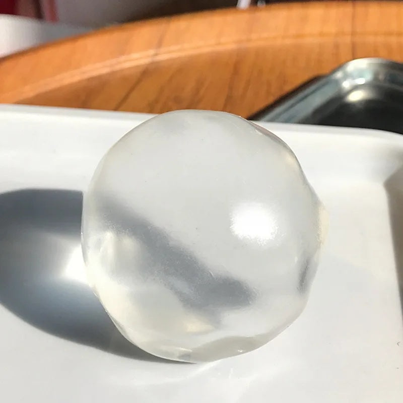 Clear coconut oil squishy ball, 6 cm