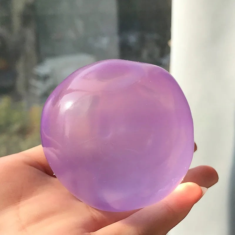 Purple coconut oil squishy ball, 6 cm