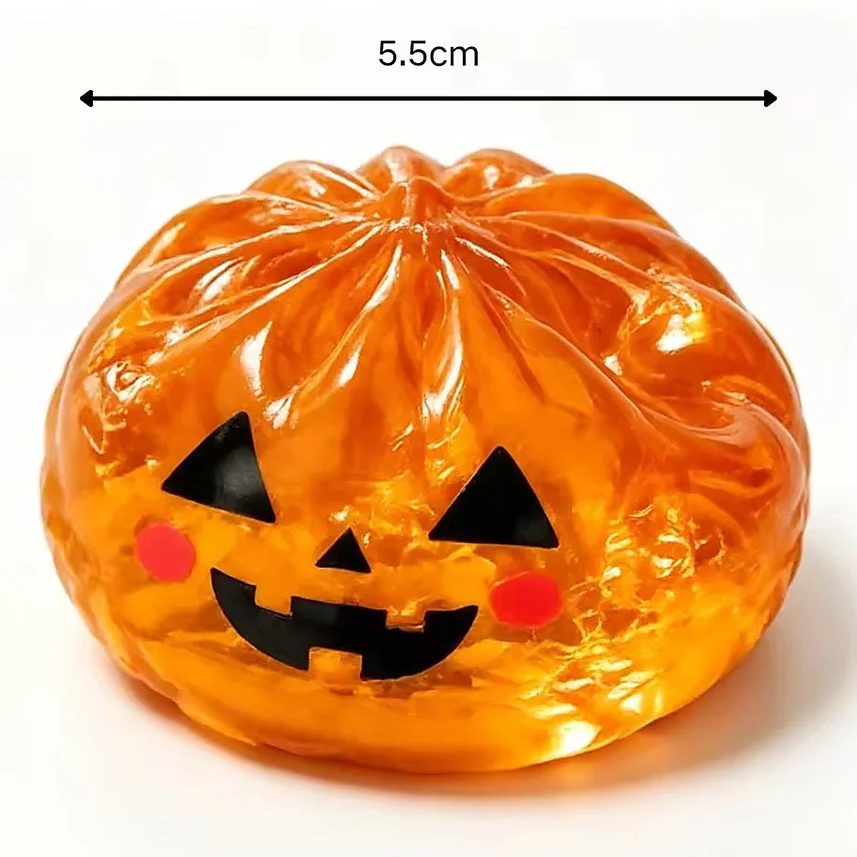 The translucent orange jack-o'-lantern Halloween dumpling squishy, 5.5 cm across, with its pleated top and toothy grin.