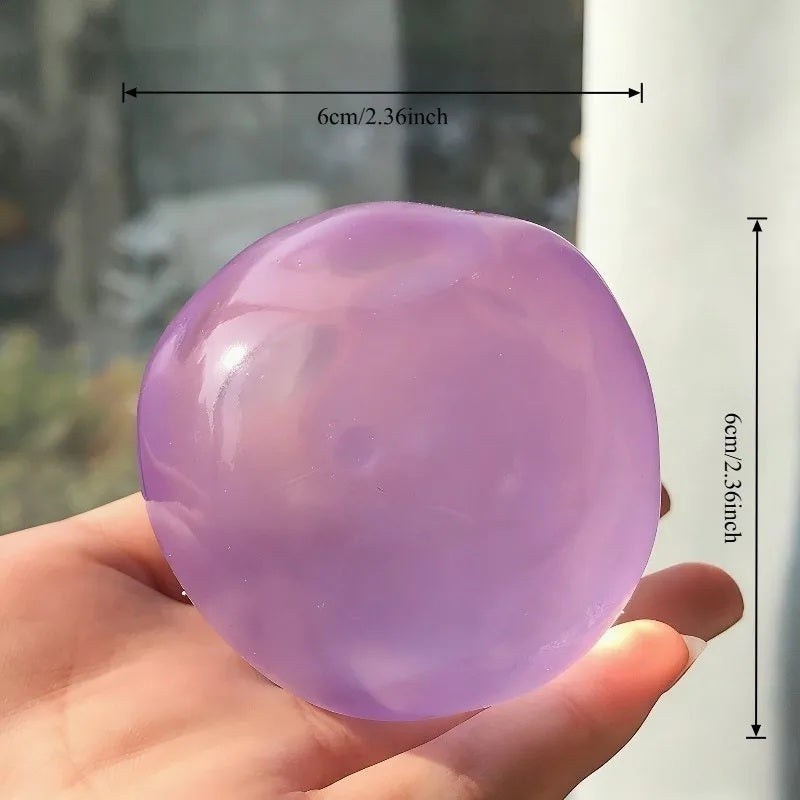 Coconut oil squishy ball measured at 6 cm, 2.36 inches across
