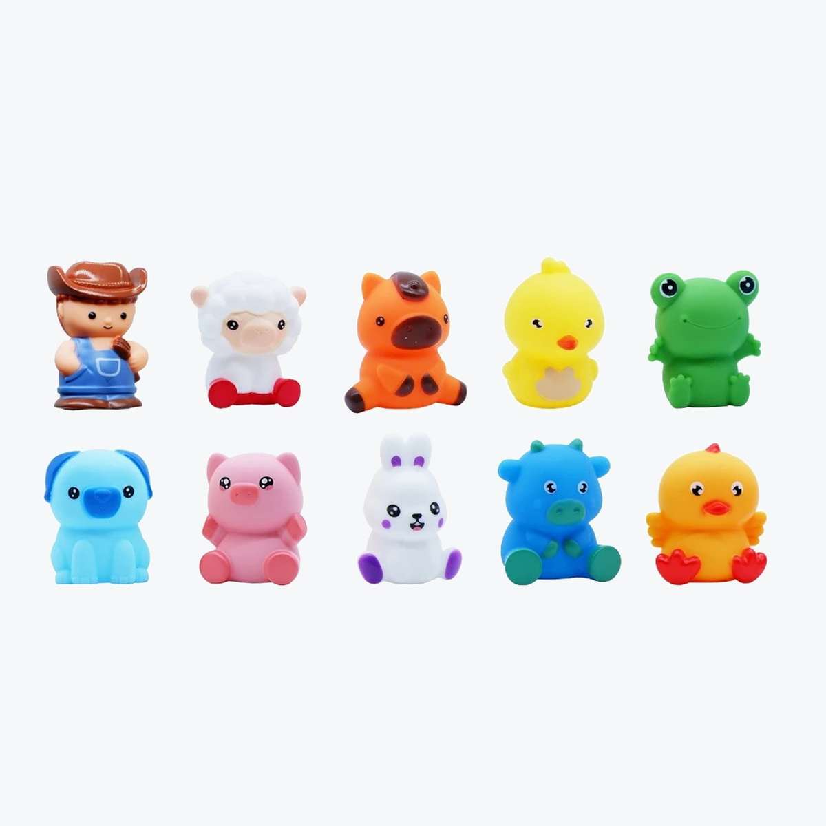 The nine farm animals and the farmer figure that come with the train