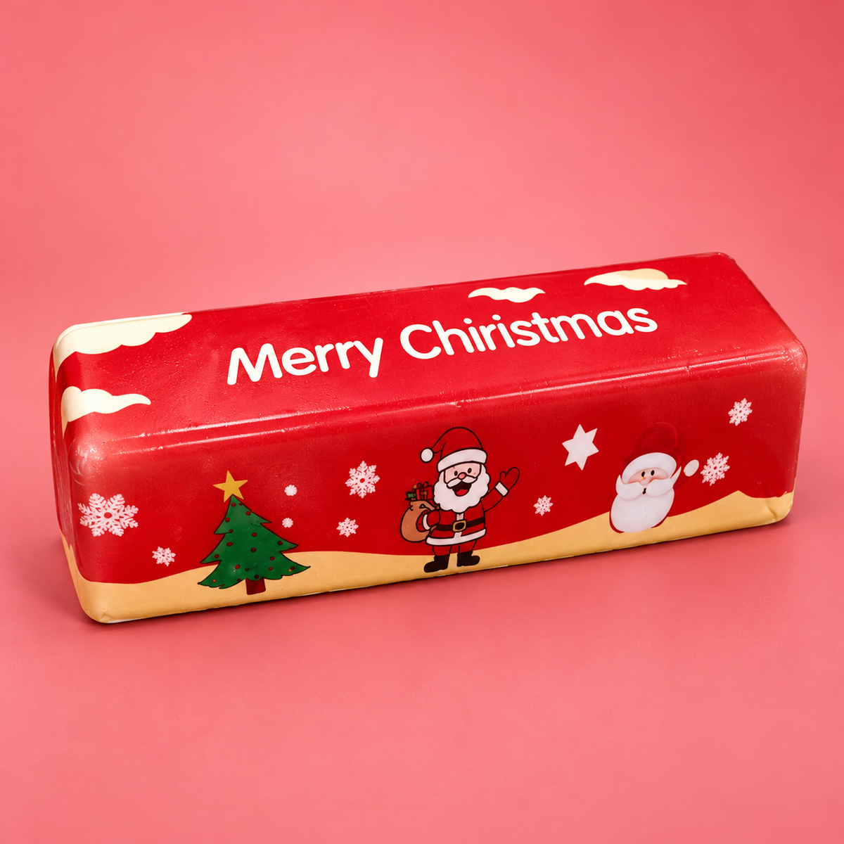 Christmas butter squishy, red Merry Christmas butter stick on a plain red background