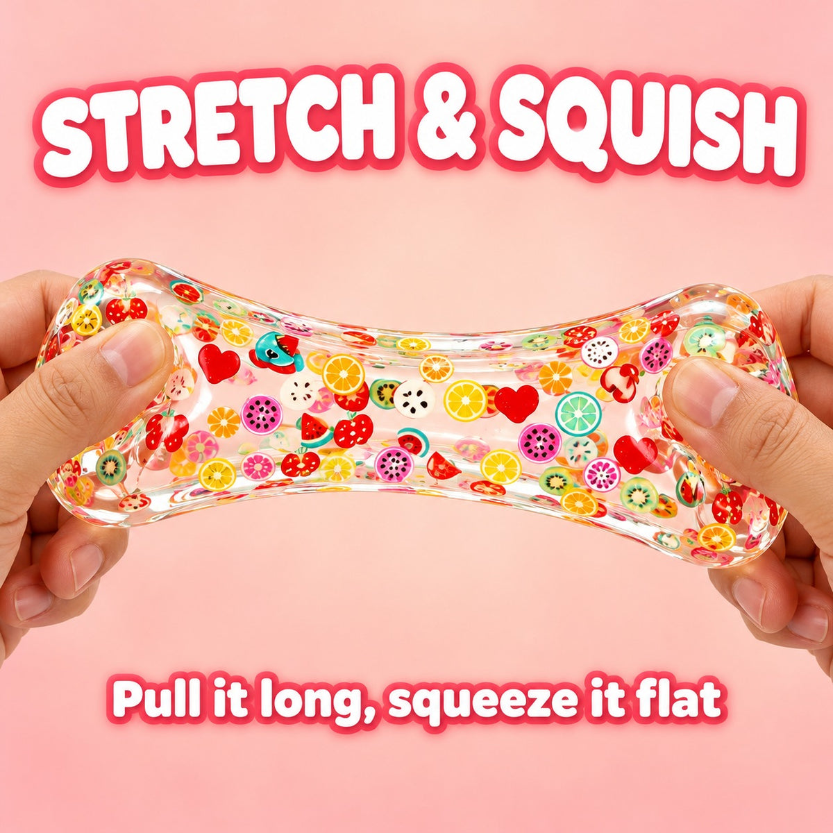 Two hands stretching the fruit ice cube squishy long: stretch and squish