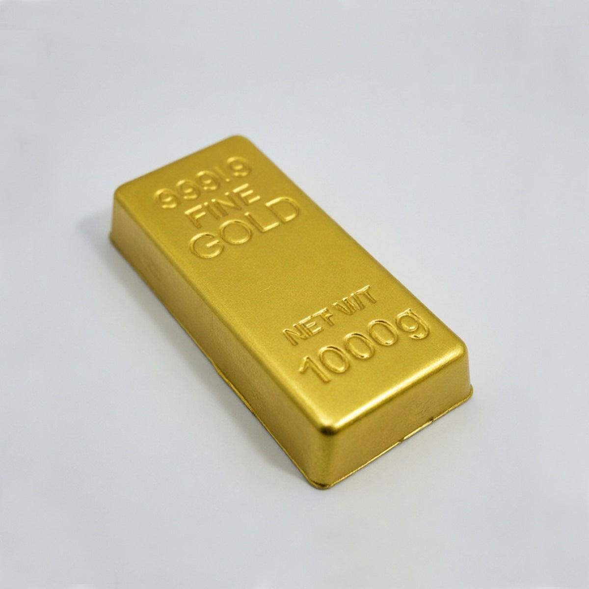 Gold bar squishy, 5 inch fake gold brick stamped 999.9 Fine Gold, on a white background