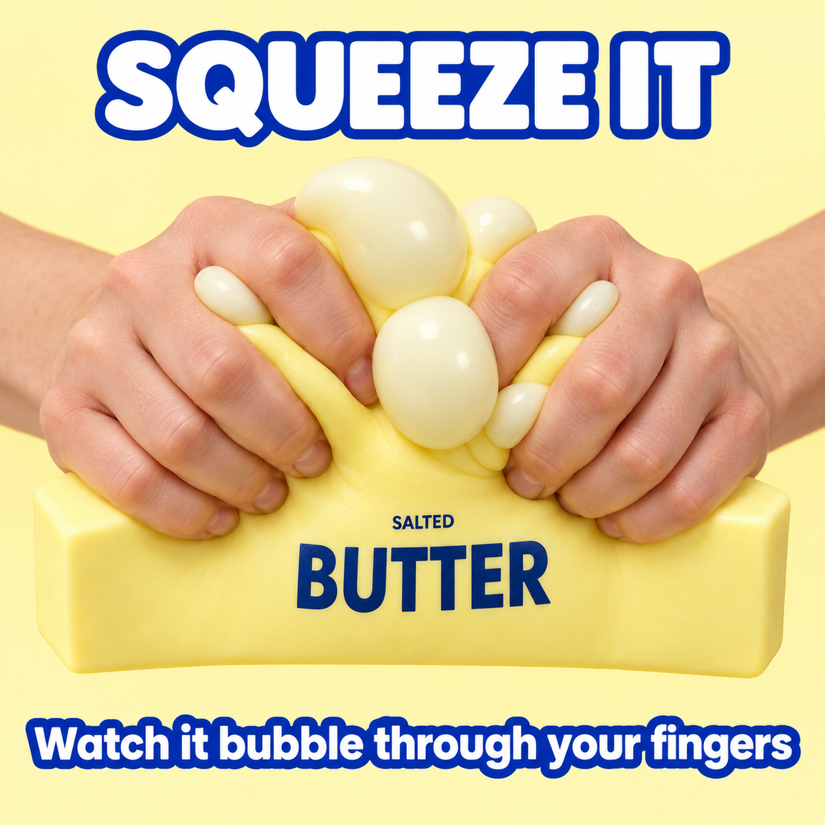 Hands squeezing the jumbo butter squishy, white bubbles pushing out between the fingers