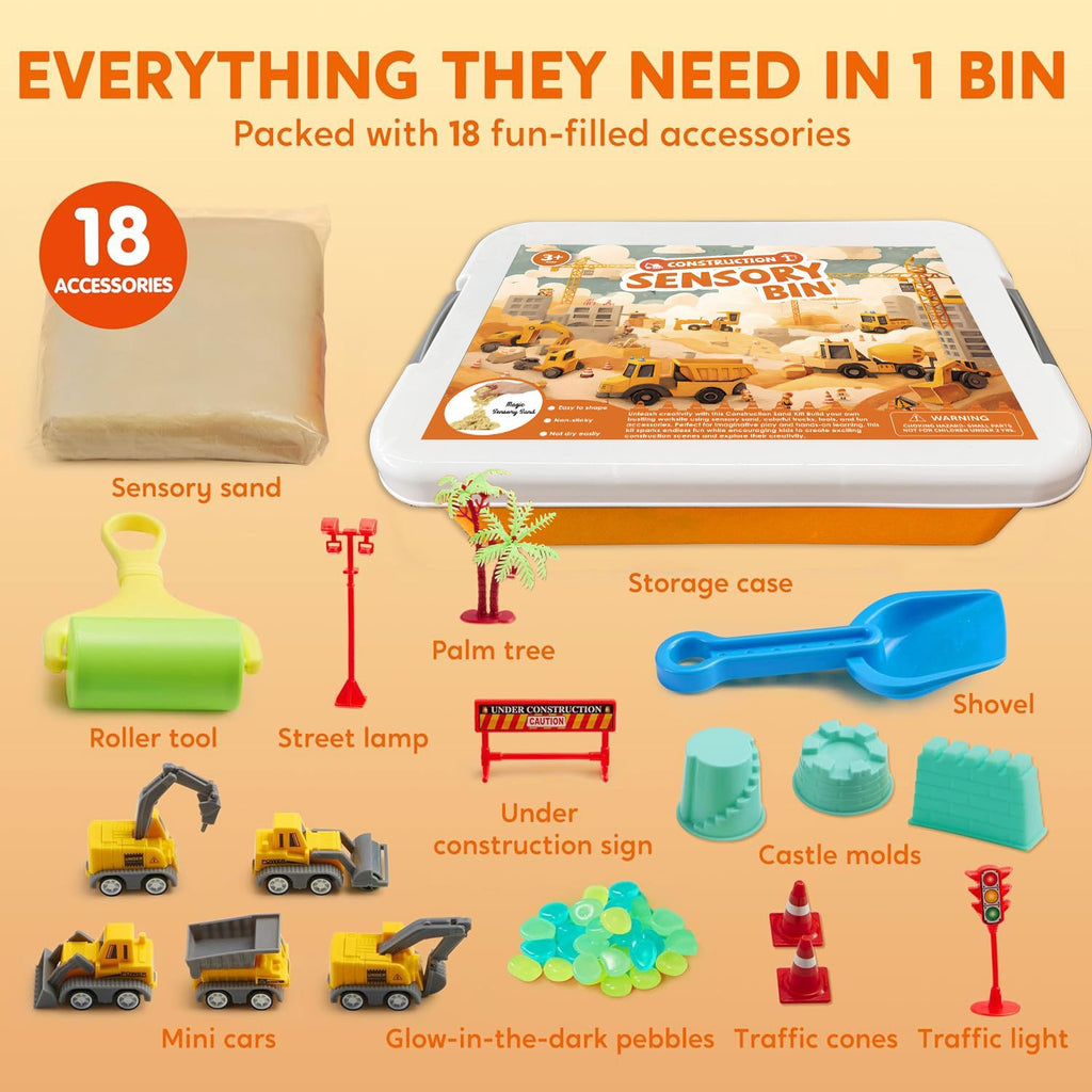 Construction sensory bin contents: kinetic sand, diggers, castle moulds and glow stones
