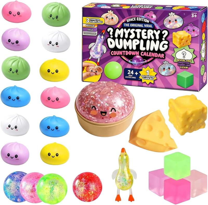 Everything inside the Mystery Dumpling countdown calendar: twelve mini dumplings, one big glitter dumpling in its steamer, cheese, a stretchy duck, jelly cubes and glitter balls