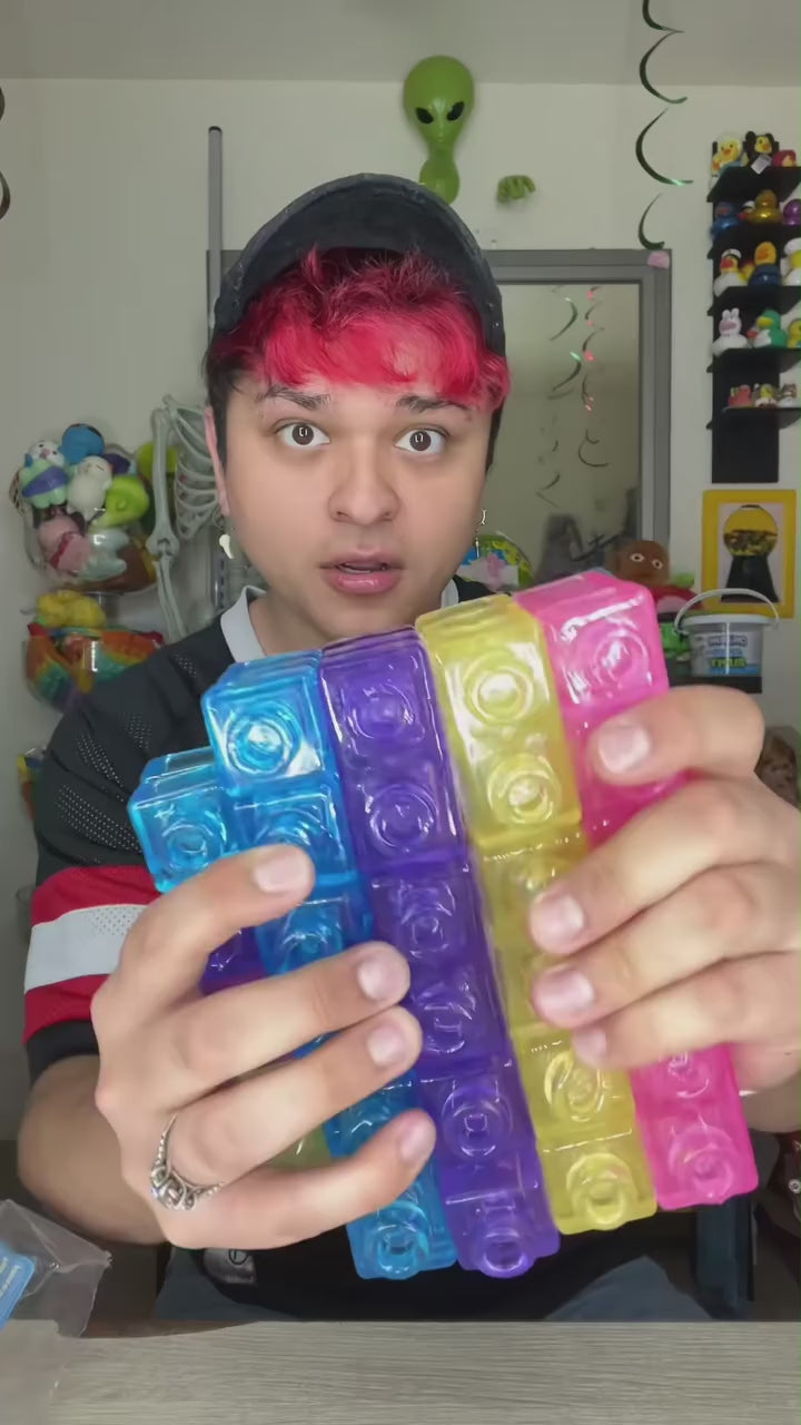 Squishing jelly blocks in one hand