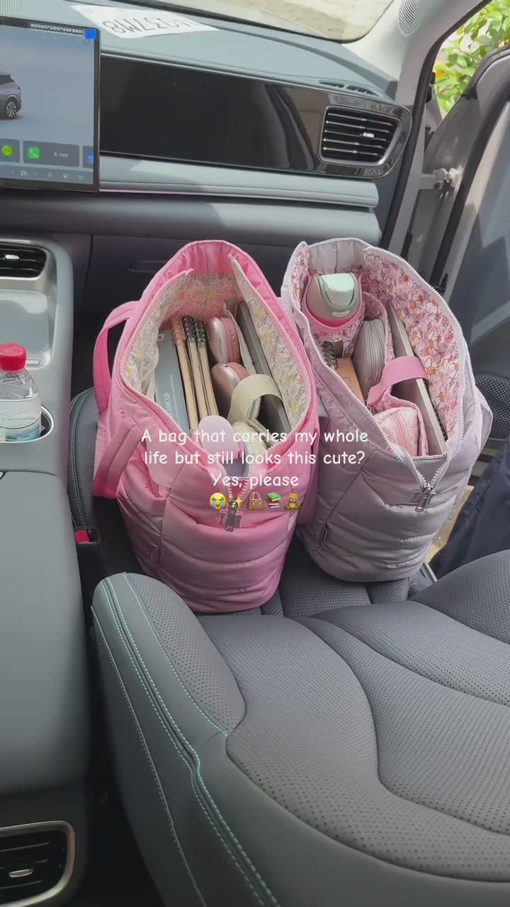 Pink and lavender puffer tote bags opened to show the organised compartments