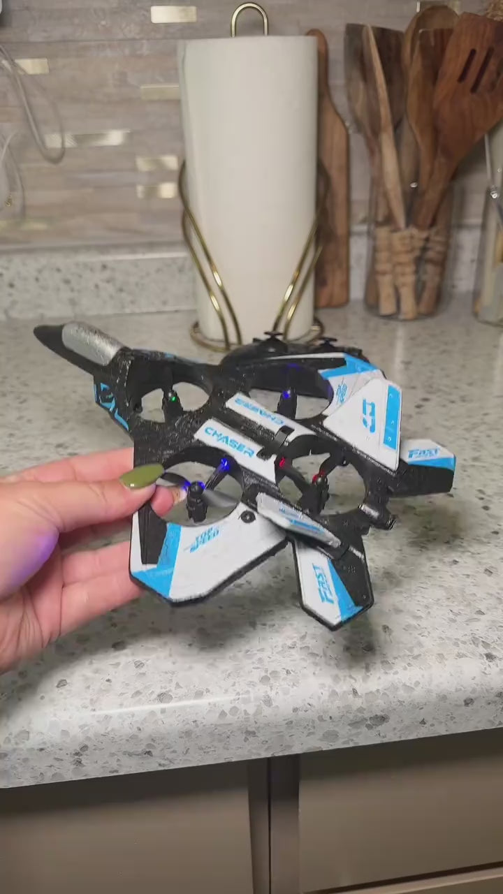 A child catching the remote control fighter jet outdoors