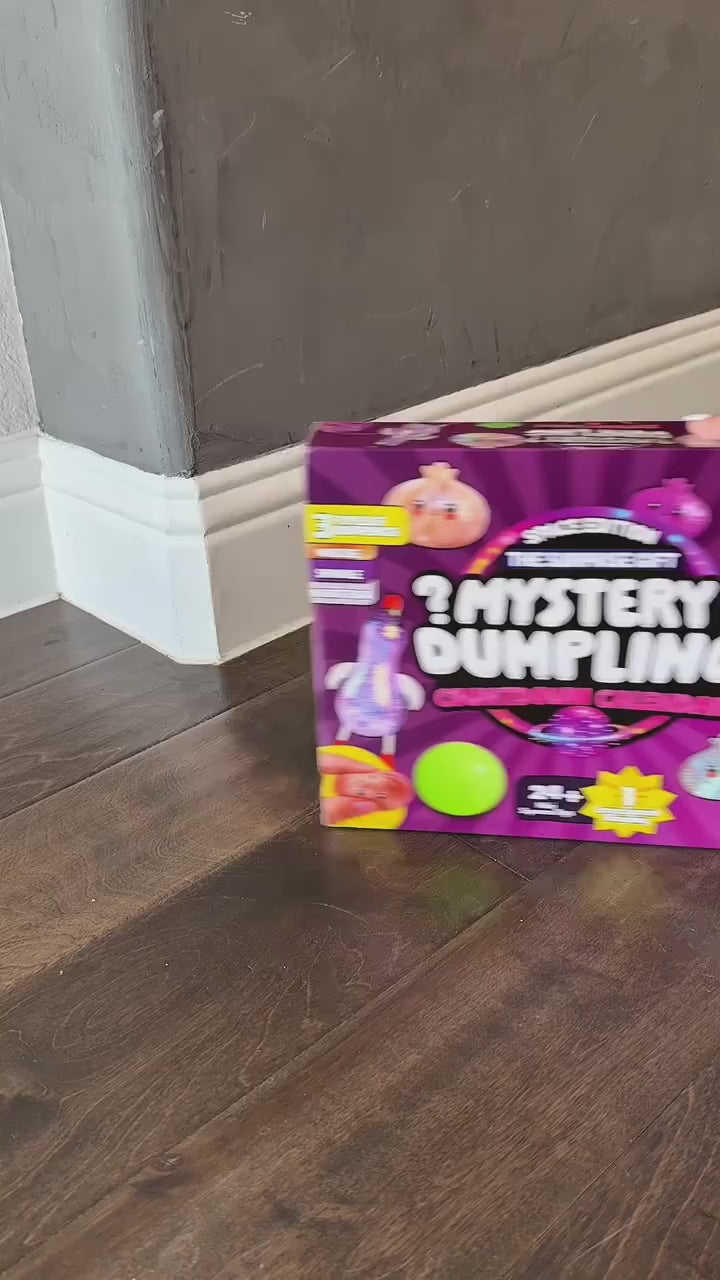 Opening the countdown calendar and squeezing the mini squishies