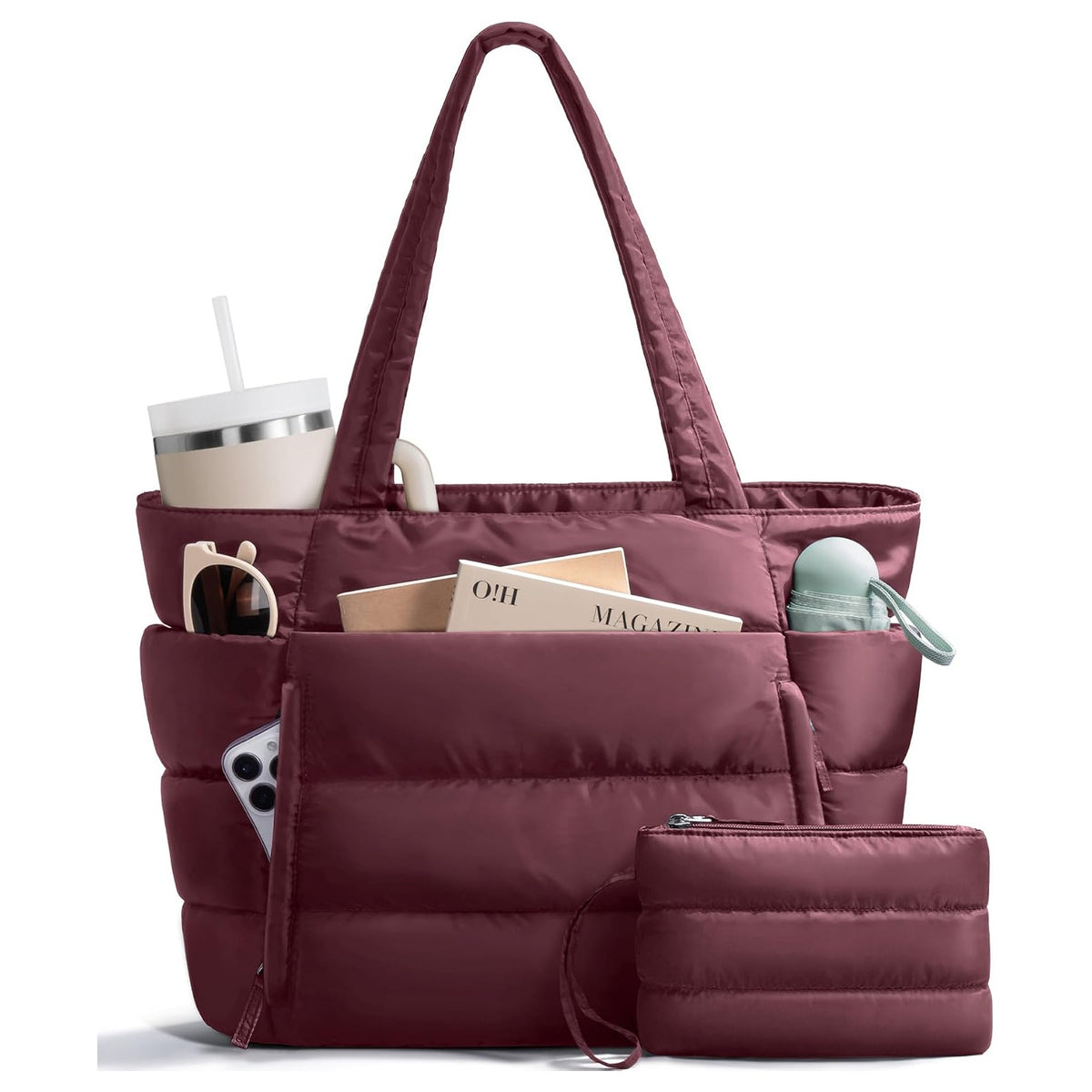 Burgundy puffer tote bag with matching pouch, loaded with a magazine and a water bottle