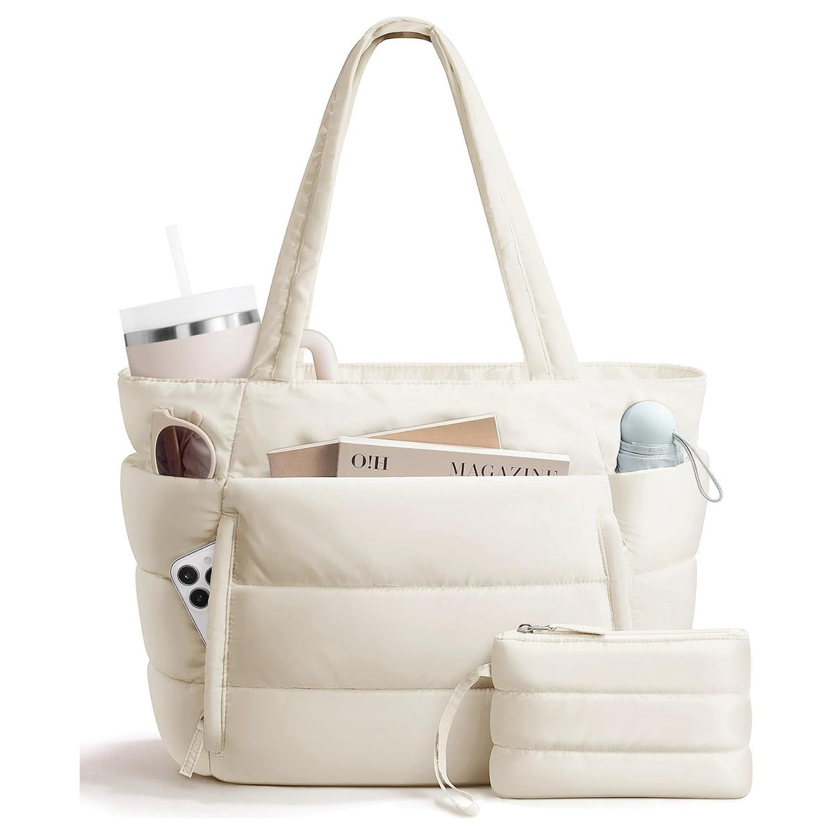 Cream puffer tote bag with matching pouch, sunglasses and a tumbler in the outside pockets