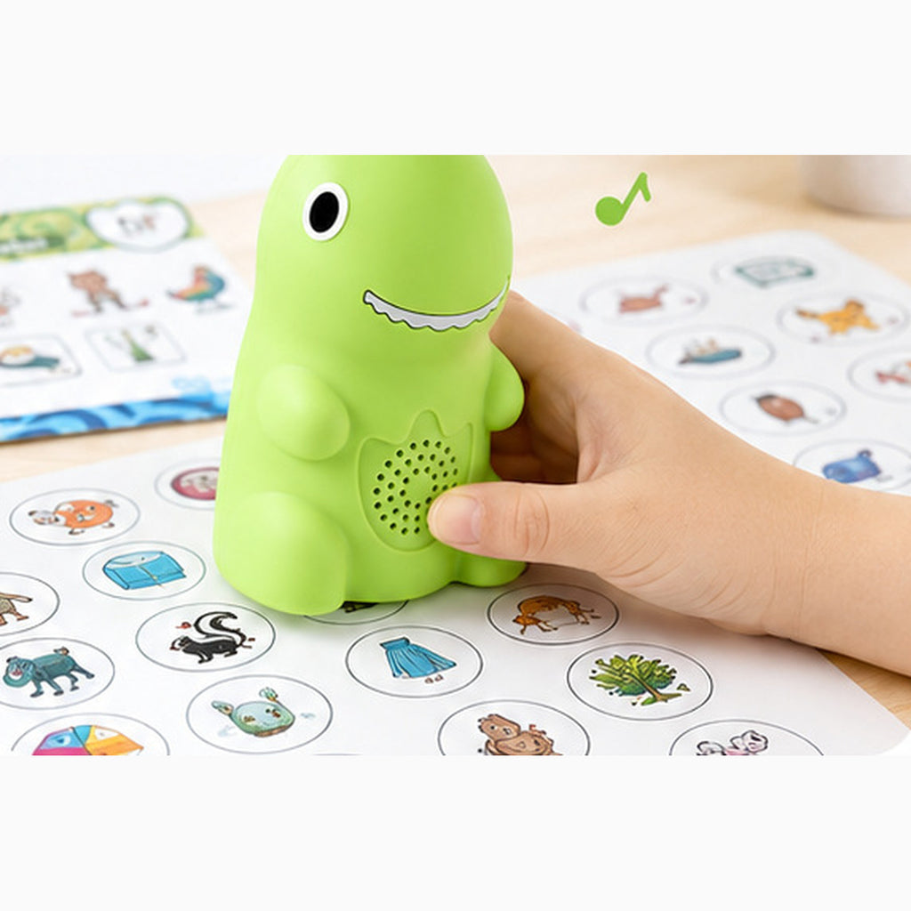 The dinosaur reader placed on a sheet of round picture stickers, the second way to use him