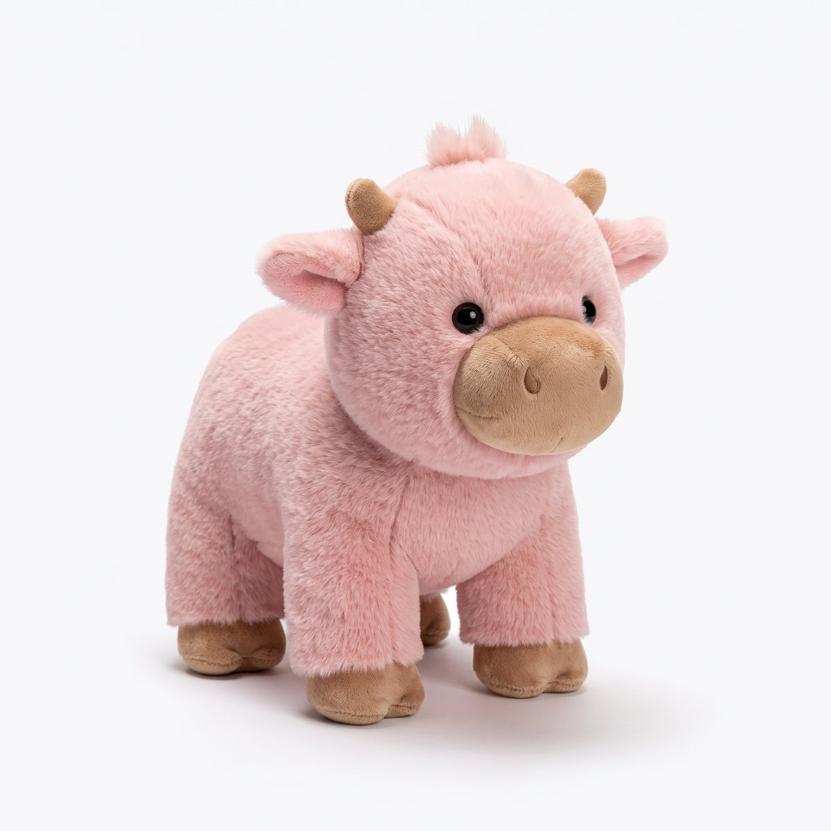 The pink running Highland cow plush on a white studio background