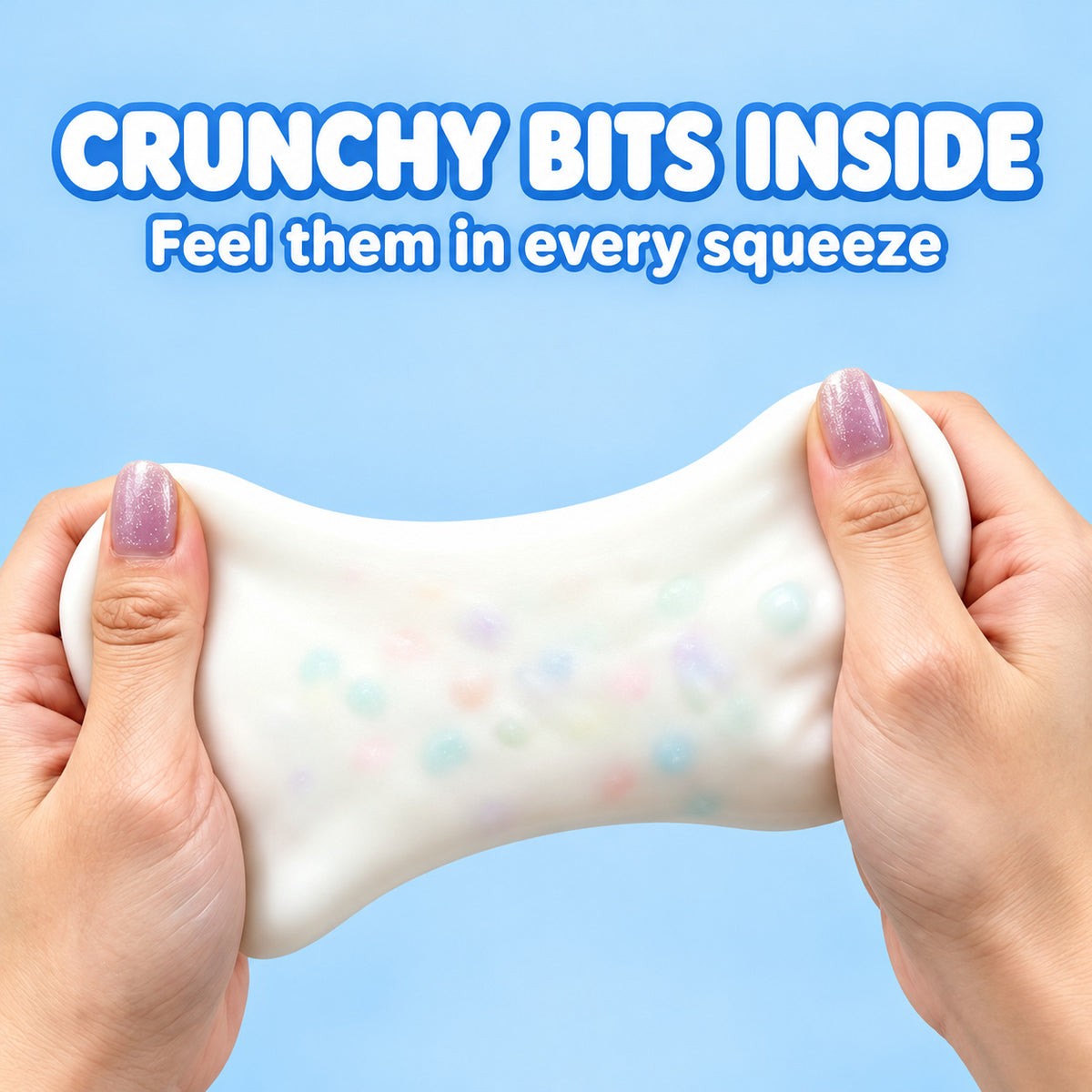 Two hands stretching the white squishy soap bar: crunchy bits inside