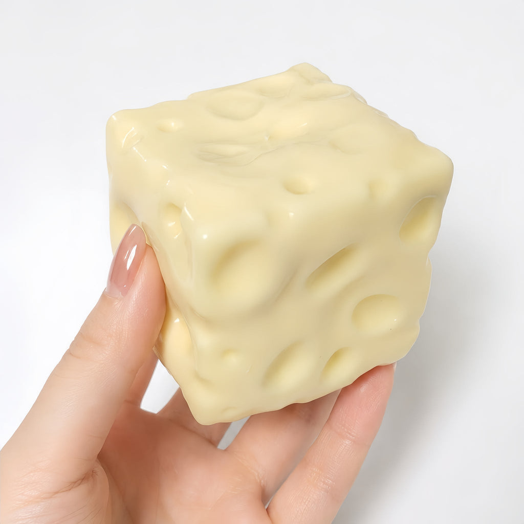 Yellow cheese squishy held in a hand
